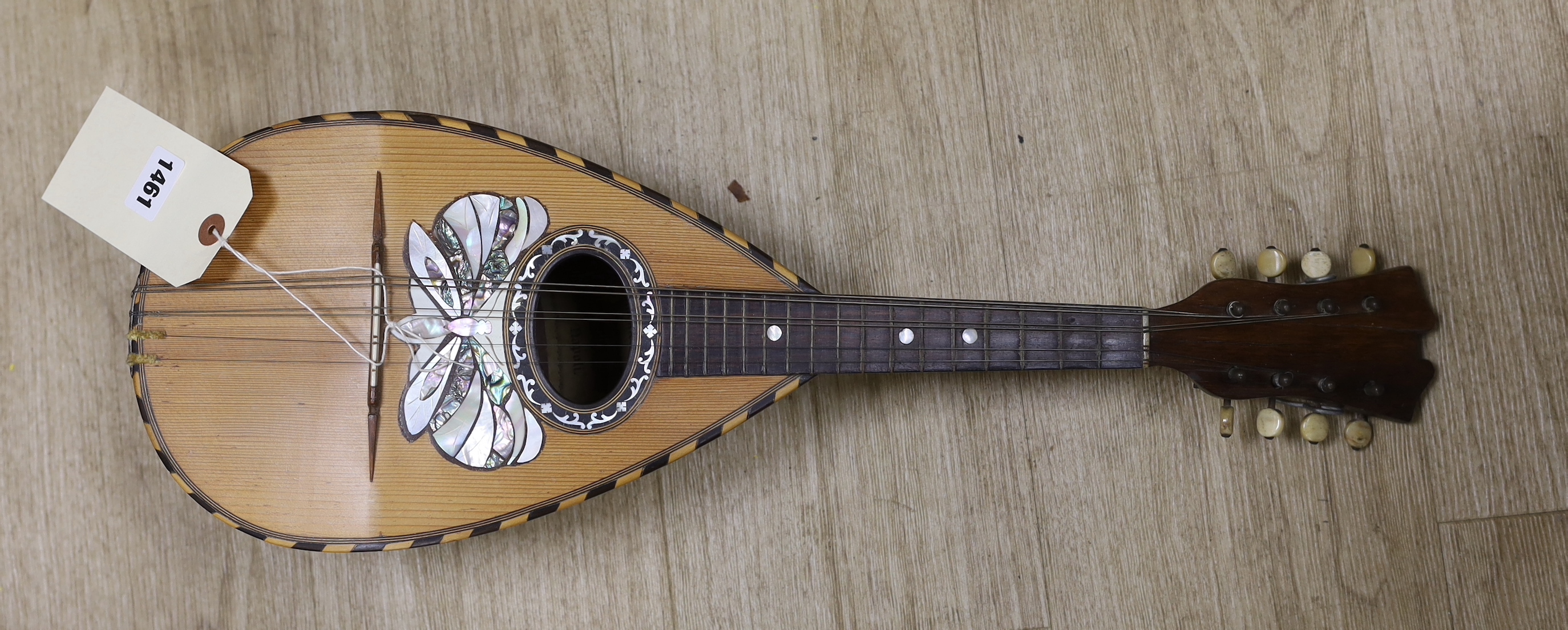 A small late 19th/early 20th century mandolin, label to interior, Dominico Banoni, Naples